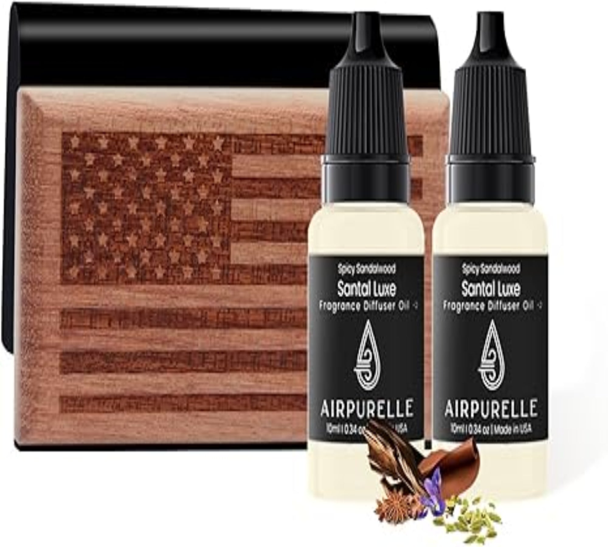 Two bottles of Airpurelle Santal Luxe fragrance diffuser oil with a wooden block featuring an American flag design.